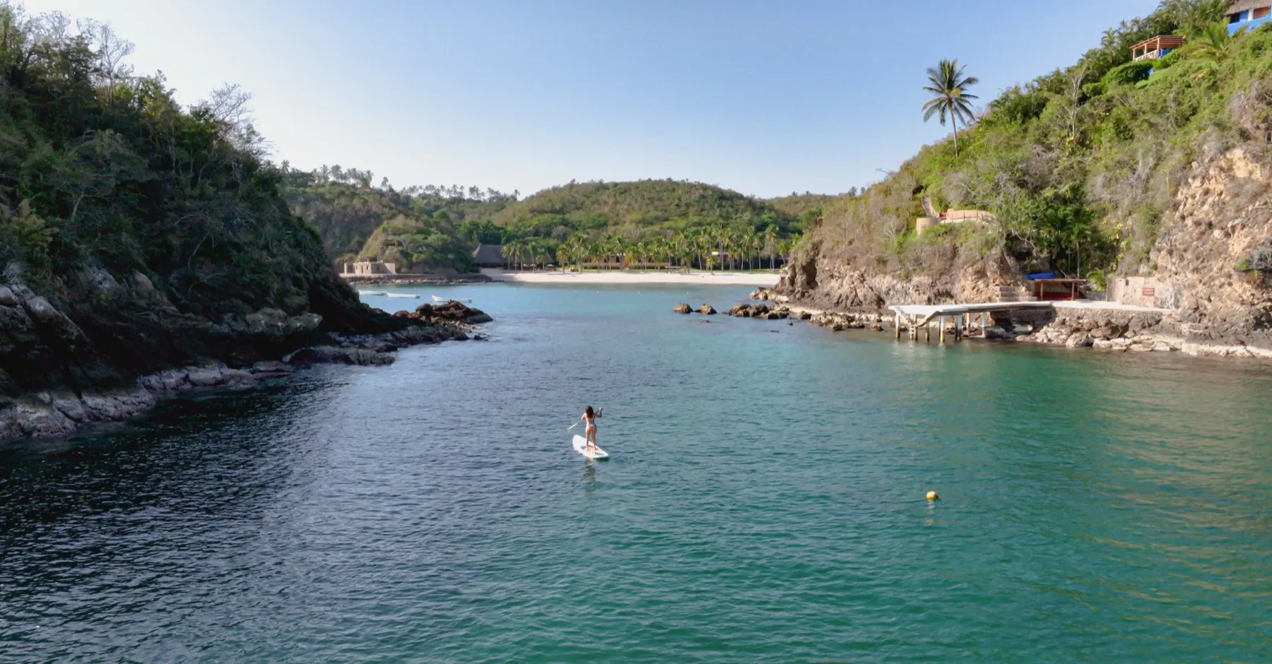 Paddle-boarding in a calm cove on the Costalegre coast